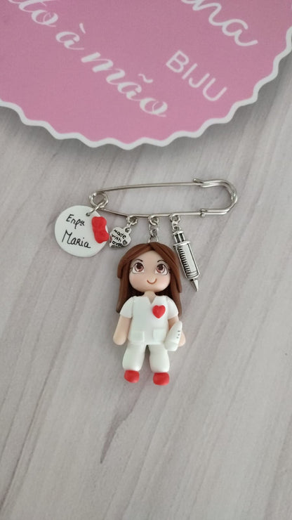 Pregadeiras e porta-chaves Enfermeira